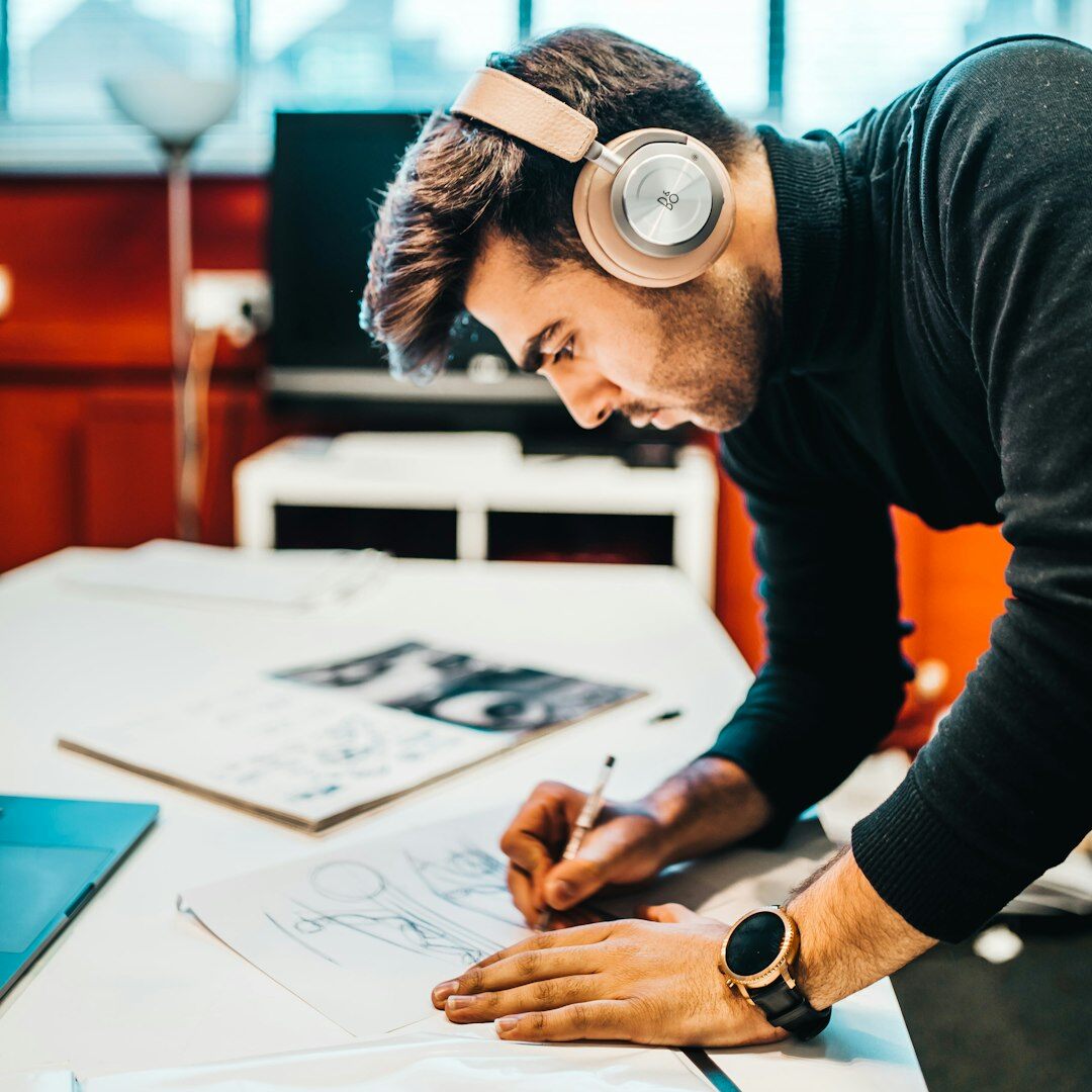 Male audio engineer and instructor with headphones