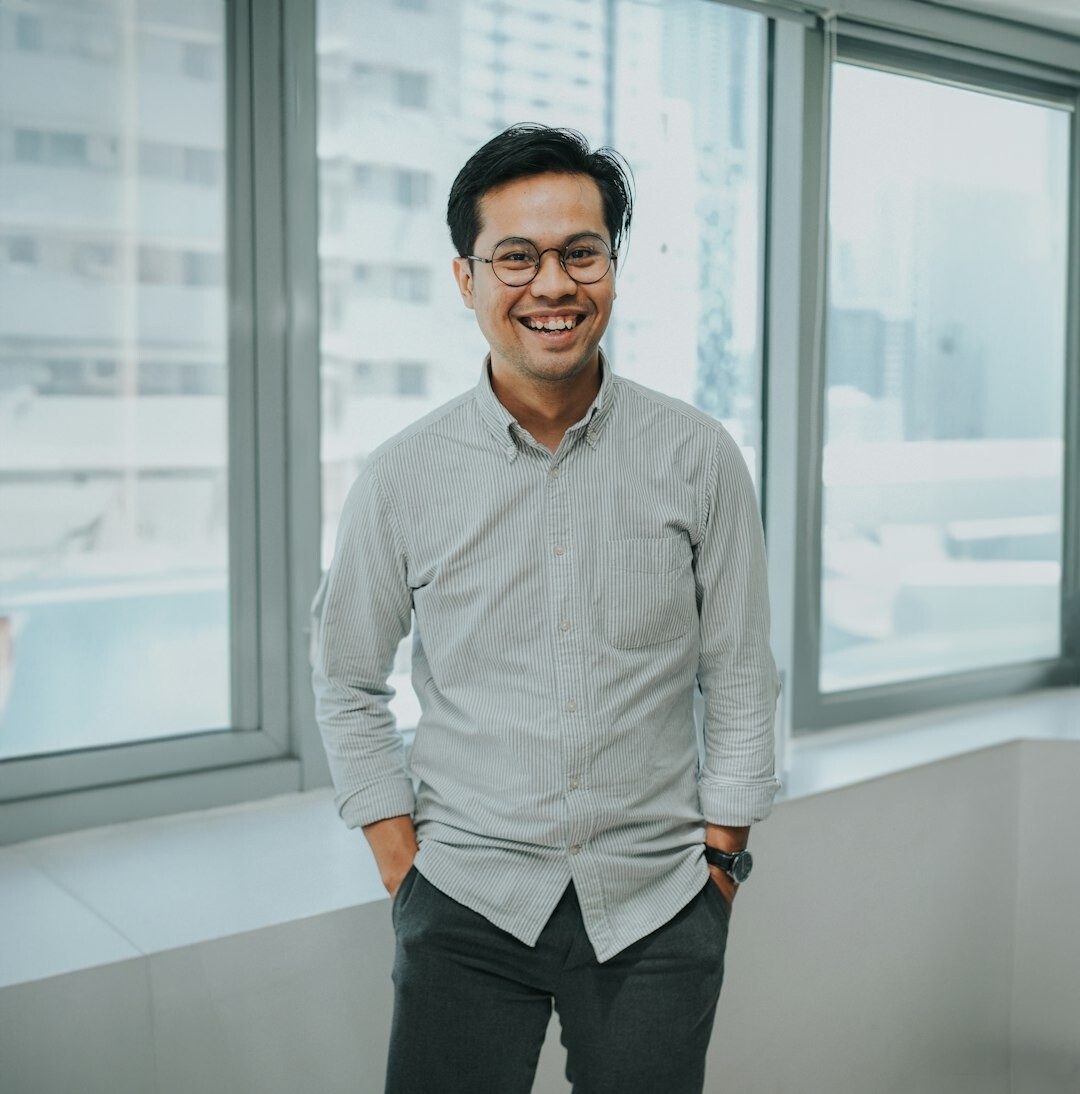 Male digital broadcast instructor smiling