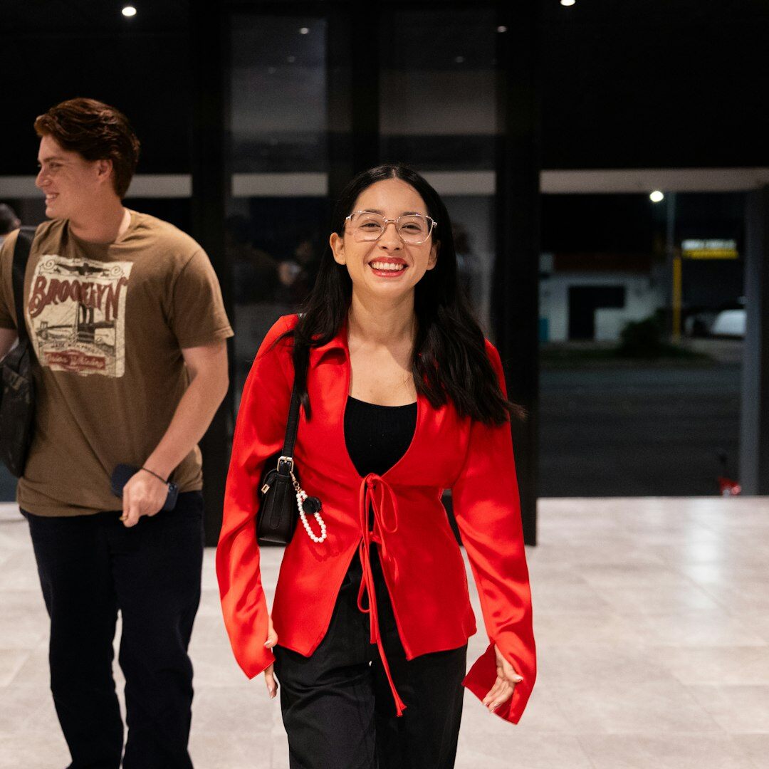 Professional female media production instructor smiling