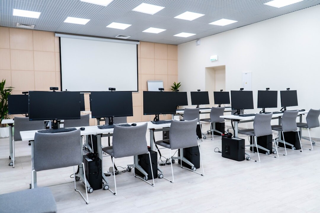 Students learning live production in a classroom with monitors